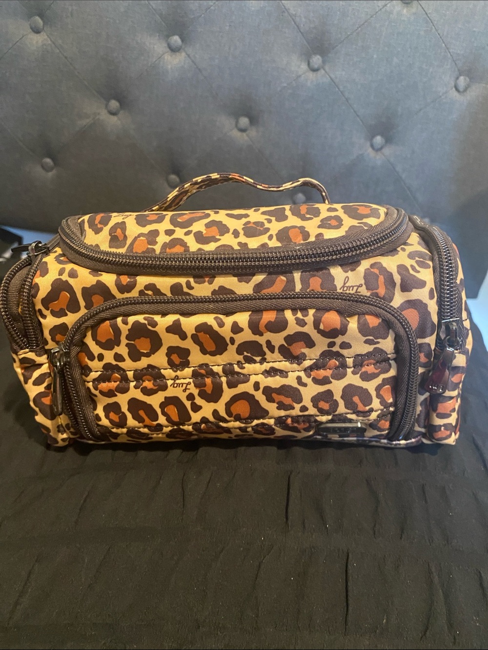lug Leopard Print Toiletry Bag in Brown and Tan